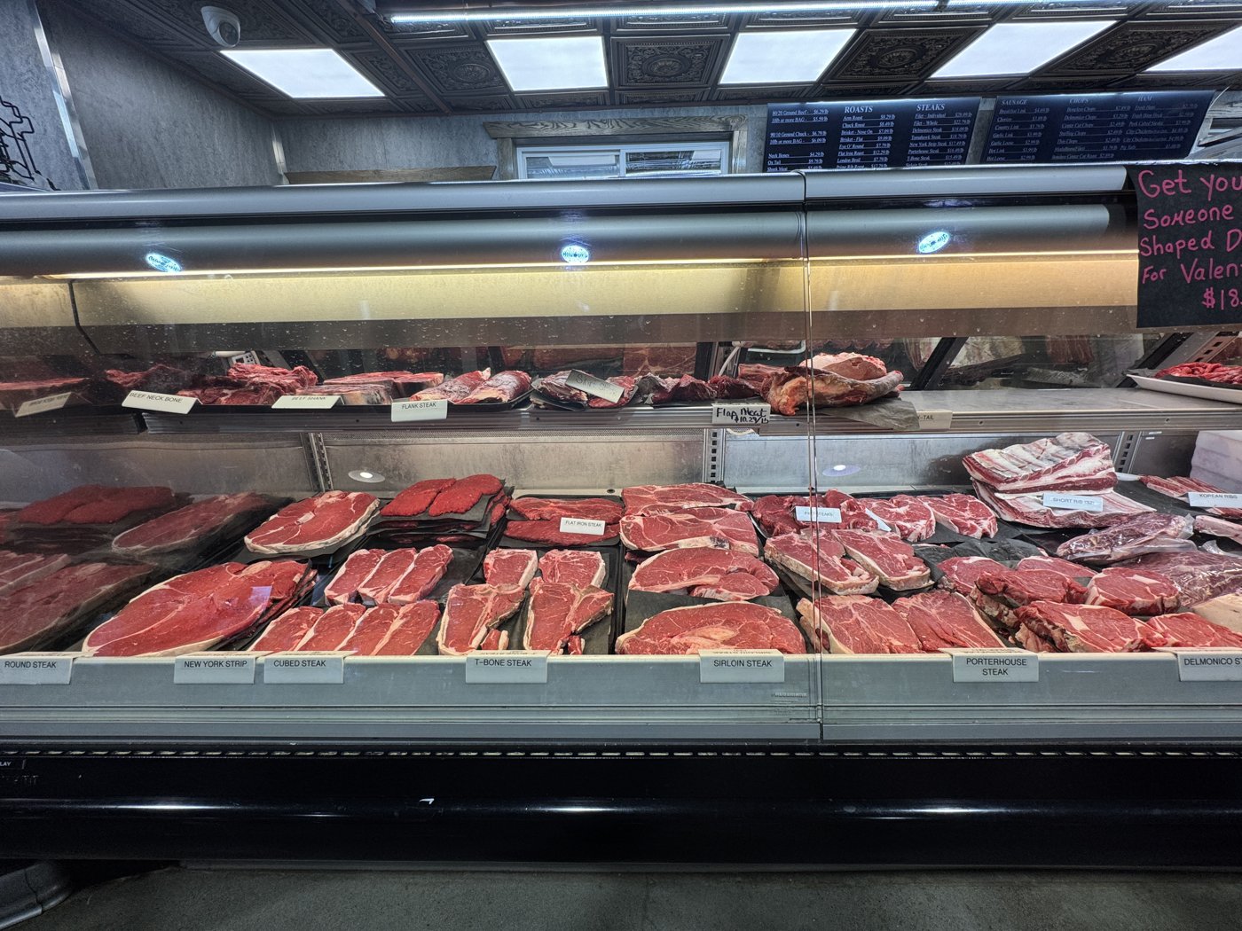 Steaks and ribs at the meat counter.